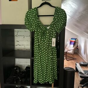 MINI REFORMATION DRESS. GREEN WITH WHITE FLOWERS. NEW WITH TAGS.